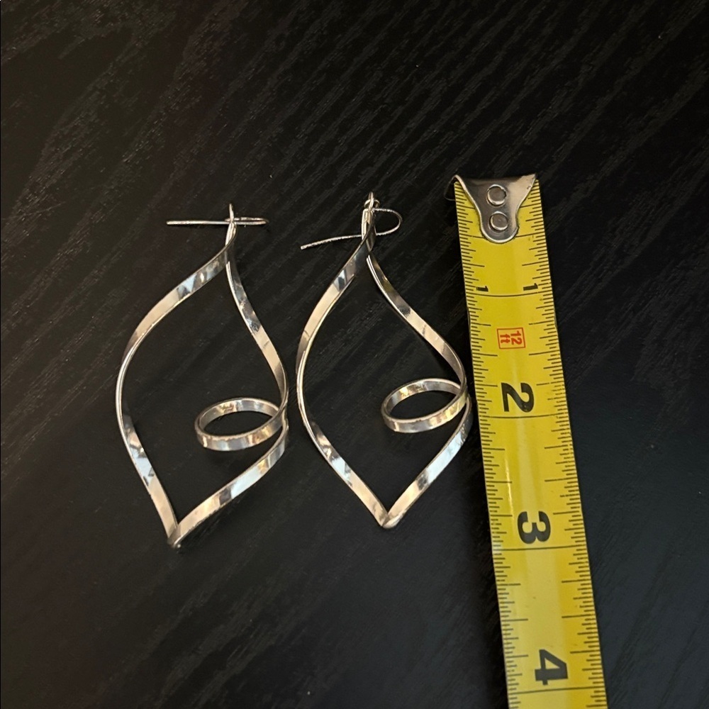 Silver Tone Twist Pierced Earrings. 3”